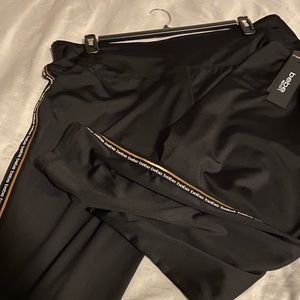 How about we work out in style black Bebe